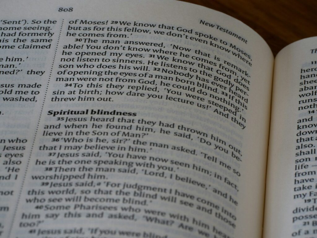 A close up of an open book on a table